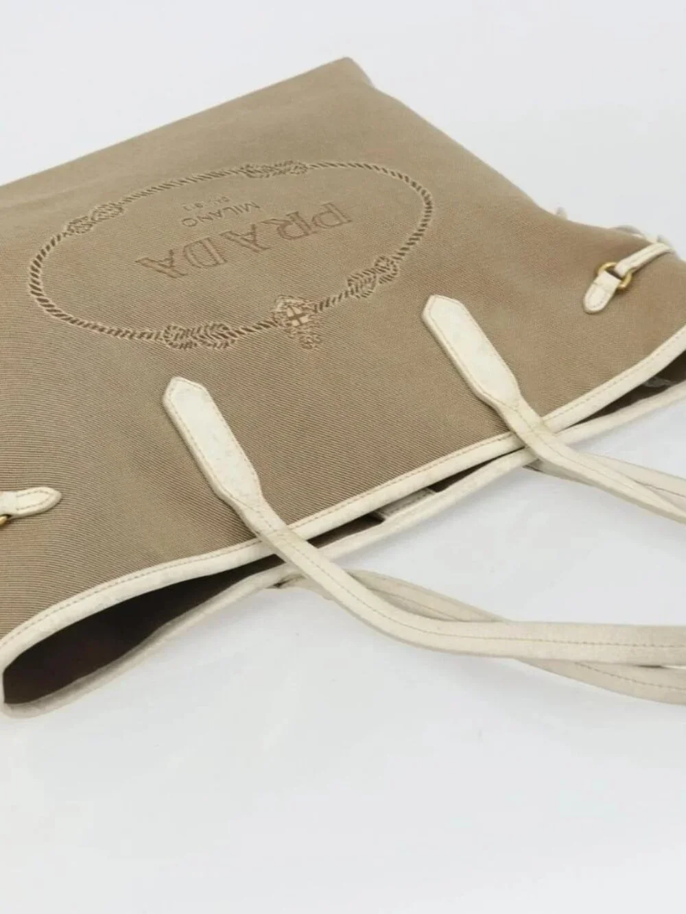 Prada brand	prada color	beige